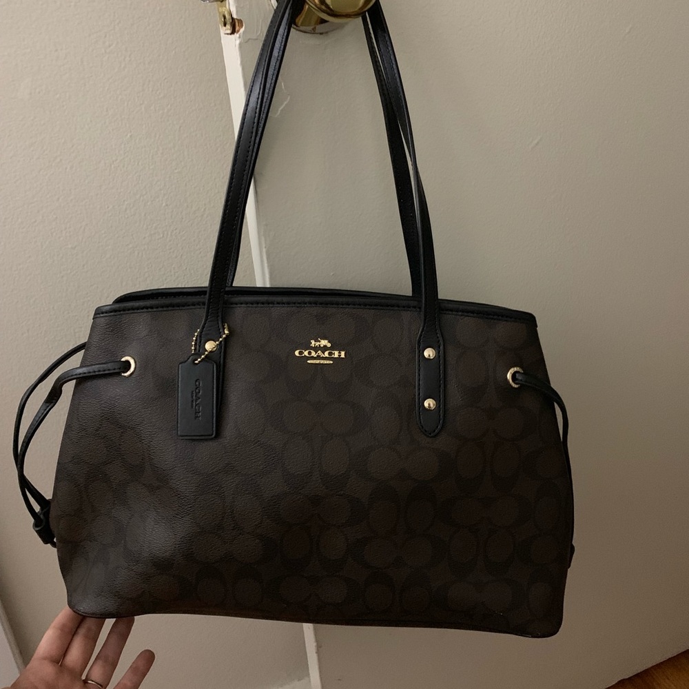 Dark brown leather signature coach bag!